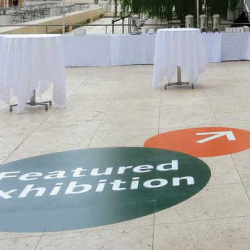 A floor graphic for an exhibition.